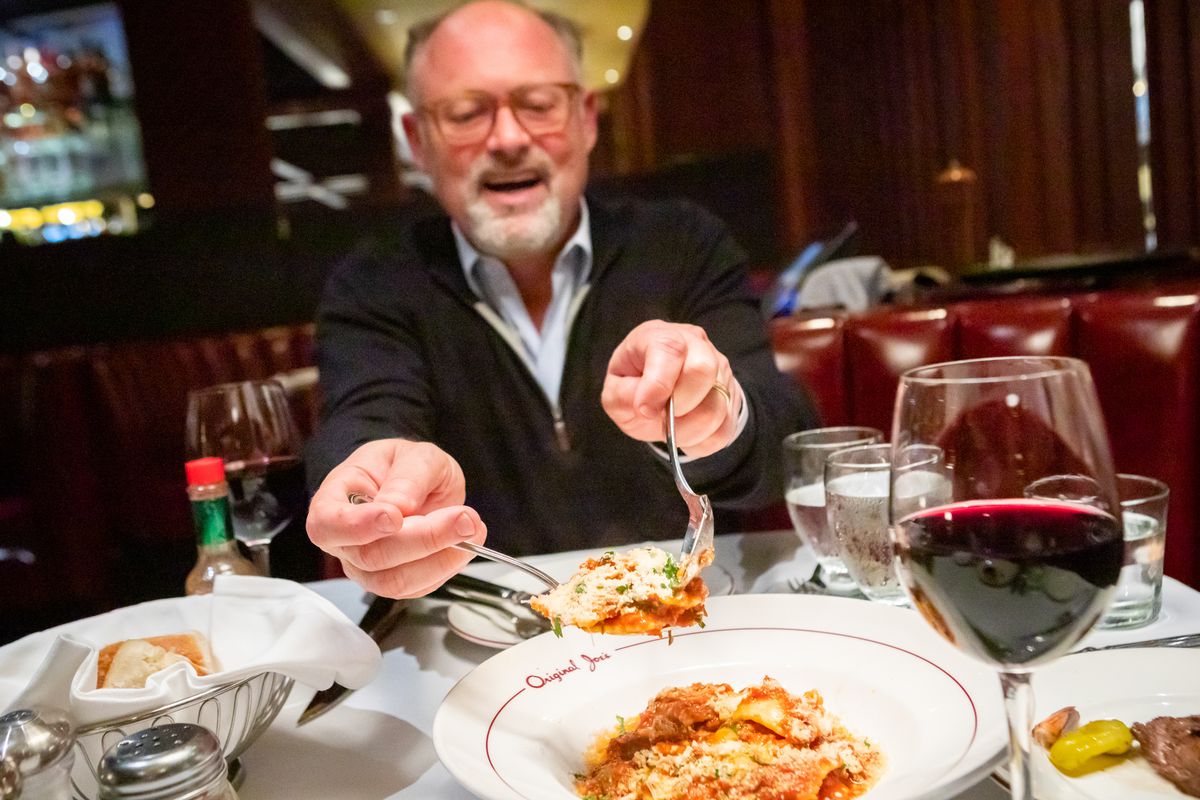 Jon Moscone dishing out a ravioli at Original Joe’s.