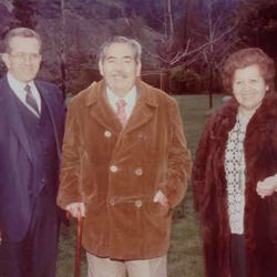 President Boyd K. Packer, left, poses with Ricardo and Perla Garcia. The Garcias were among the first groups baptized in Chile in 1956. Ricardo Garcia became a great and beloved Chilean leader. The picture was taken at the Santiago Chile Temple dedication on Sept. 15, 1983.