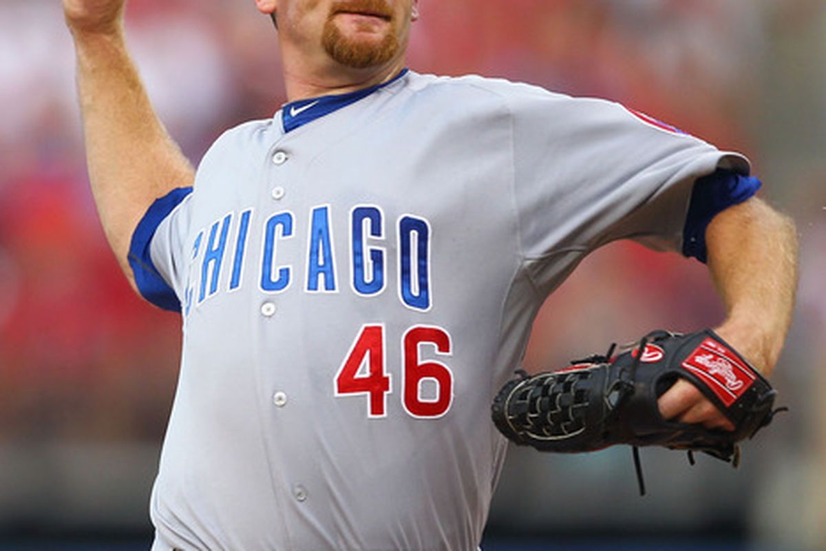 Starter Ryan Dempster of the Chicago Cubs pitches against the St. Louis Cardinals at Busch Stadium in St. Louis, Missouri.  (Photo by Dilip Vishwanat/Getty Images)