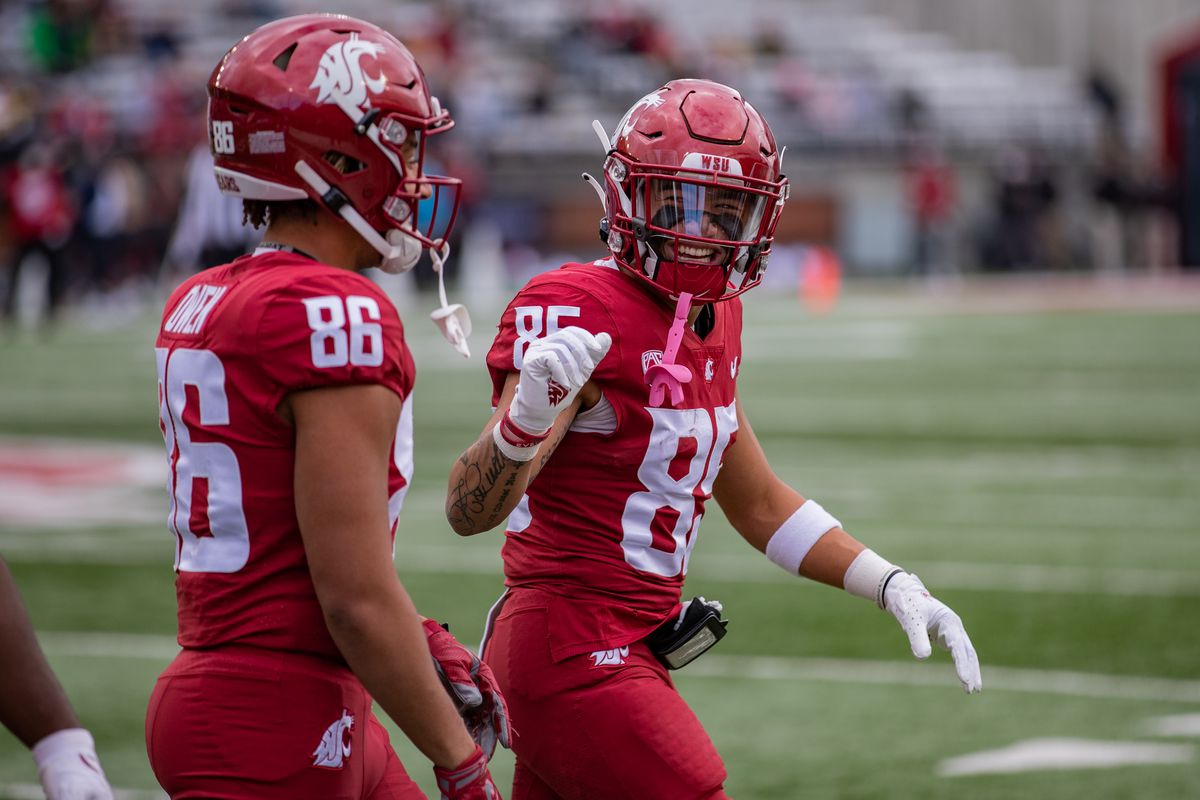 PULLMAN, WA - OCTOBER 23: Washington State wide receivers Lincoln Victor (85) and Drake Own (86) laugh during the first half of a non-conference matchup between the BYU Cougars and the Washington State Cougars on October 23, 2021, at Martin Stadium in Pullman, WA.