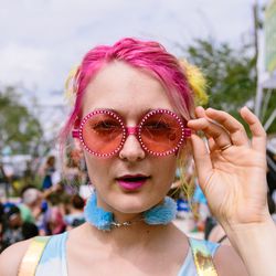 Bright pink shades and a fuzzy blue choker seen at SXSW.