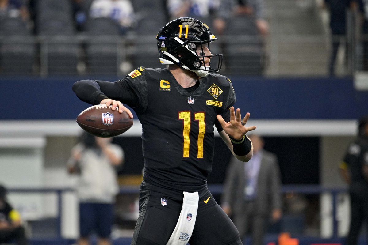 &nbsp;Washington Commanders quarterback Carson Wentz (11) in action during the game between the Dallas Cowboys and the Washington Commanders AT&amp;T Stadium.