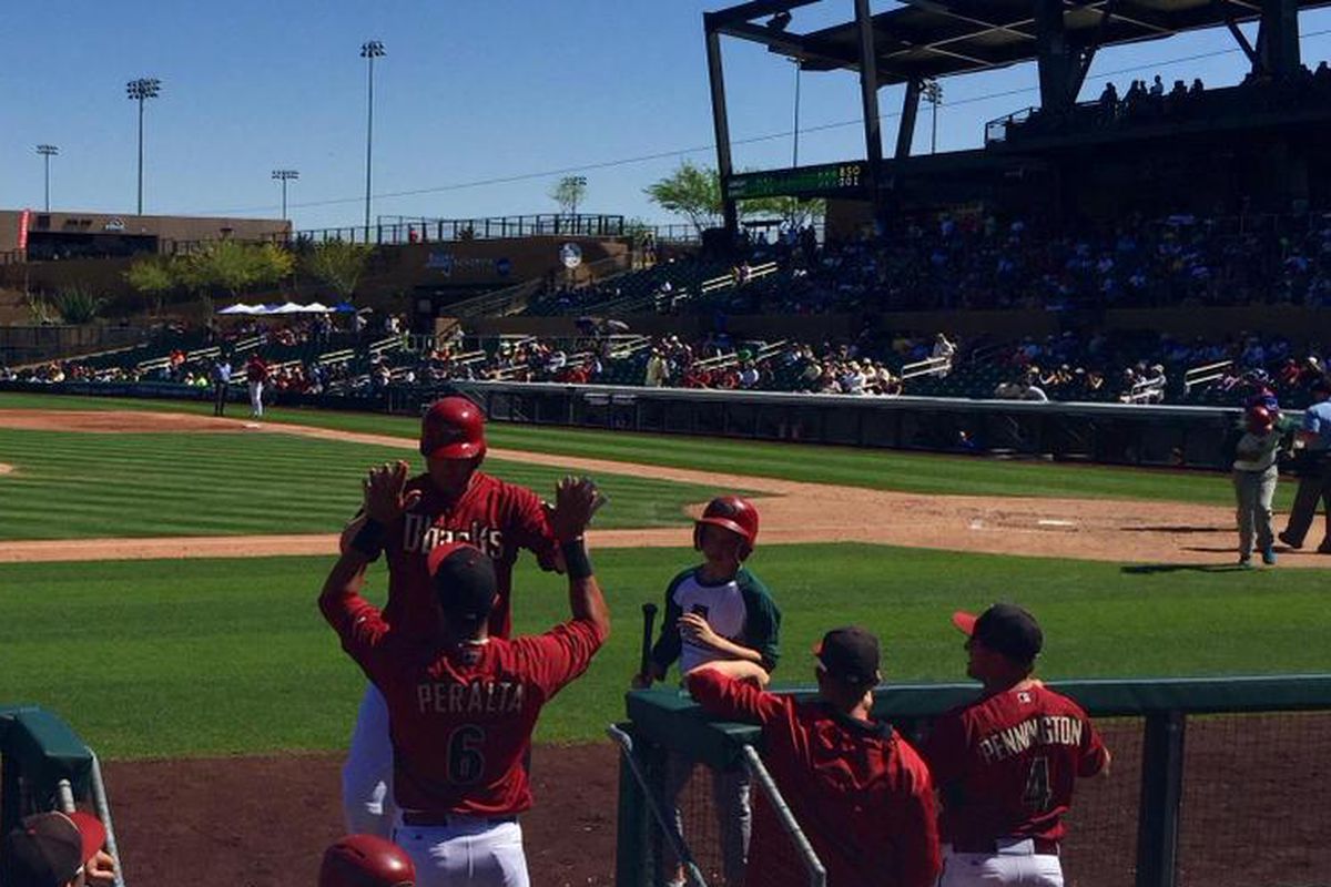 #Trumbomb! @Mtrumbo44 hits a 2-run jack into the 3rd row of cacti in center to cut the deficit to 5-3. #DbacksSpring 