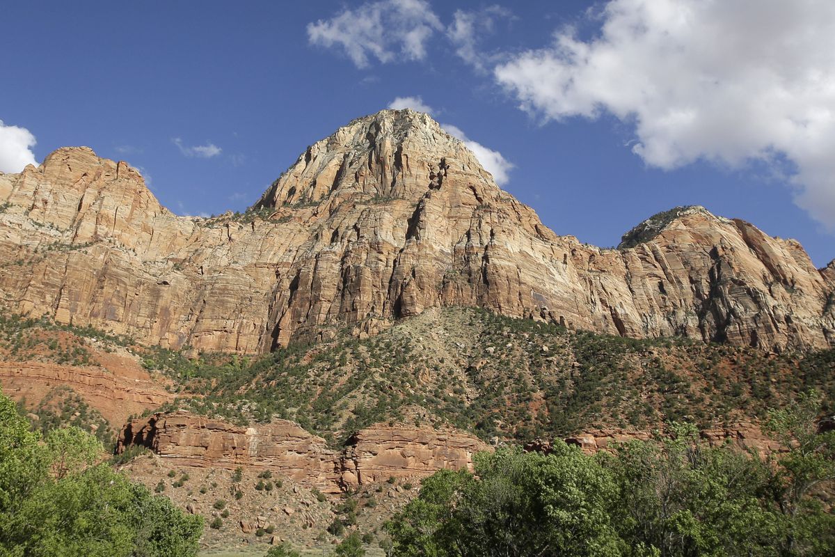 FILE - This Sept. 16, 2015, file photo, shows Zion National Park, near Springdale, Utah. Officials at Zion National Park have scheduled a series of public meetings to discuss challenges facing the park as it continues to draw record numbers of visitors. T