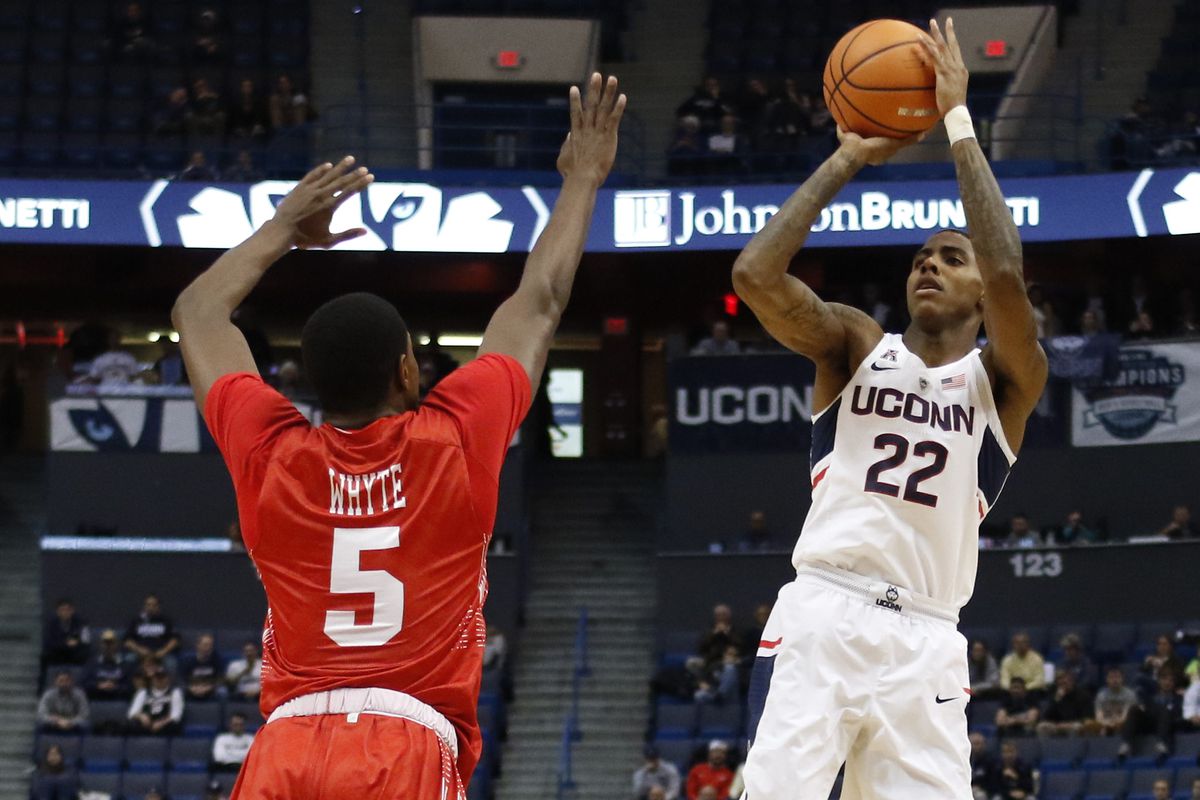 UConn's Terry Larrier (22) puts up a shot over BU's Walter Whyte (5).