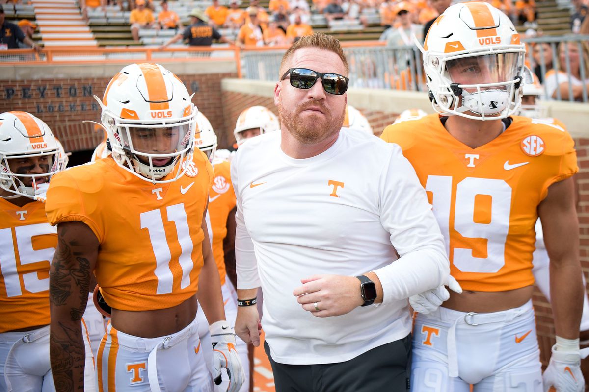 Tennessee Offensive Coordinator/Tight Ends coach Alex Golesh runs on the field before the Tennessee football season opener game against Ball State in Knoxville, Tenn. on Thursday, Sept. 1, 2022.
