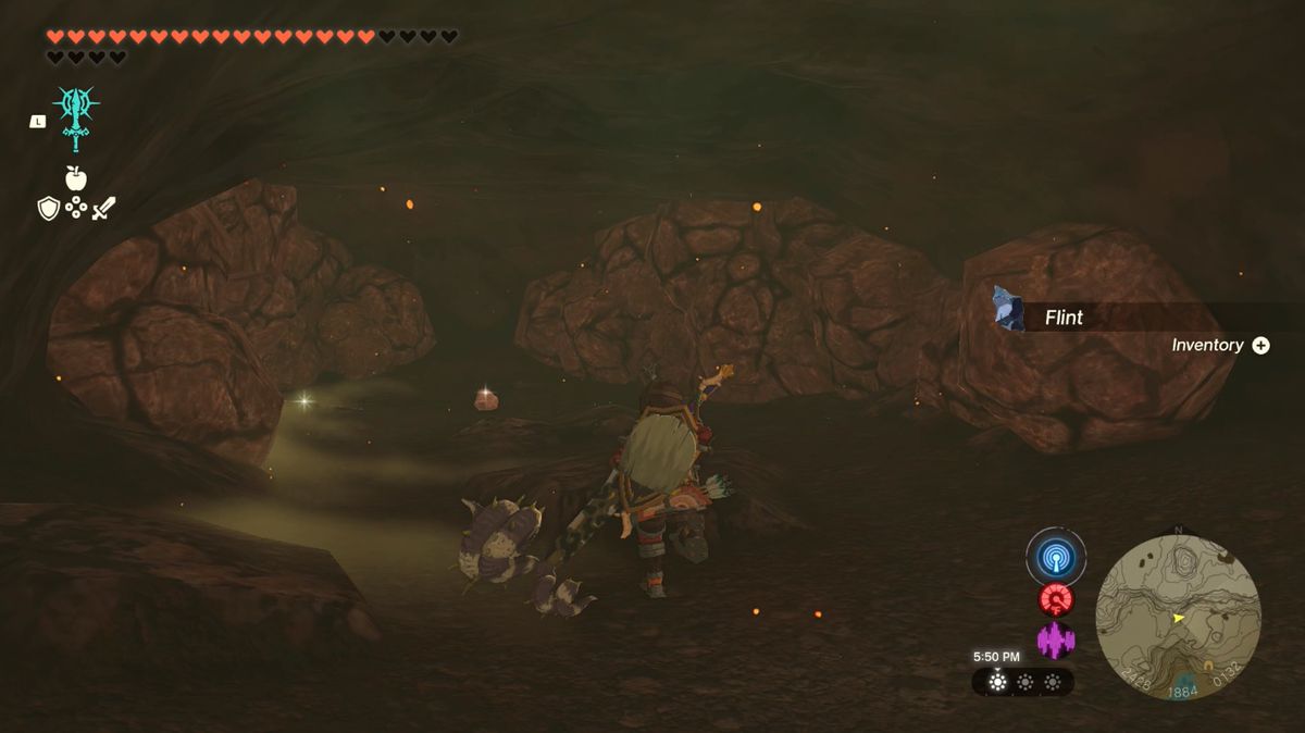 Link runs toward some boulders blocking a cave door in Lake Intenoch Cave toward Moshapin Shrine in Zelda: Tears of the Kingdom