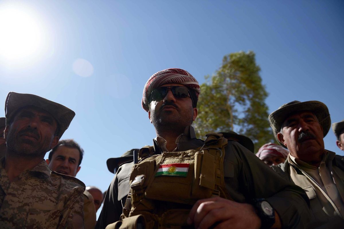 Peshmerga commander Shirvan Barzani (C) after retaking the town of Makhmur from ISIS.