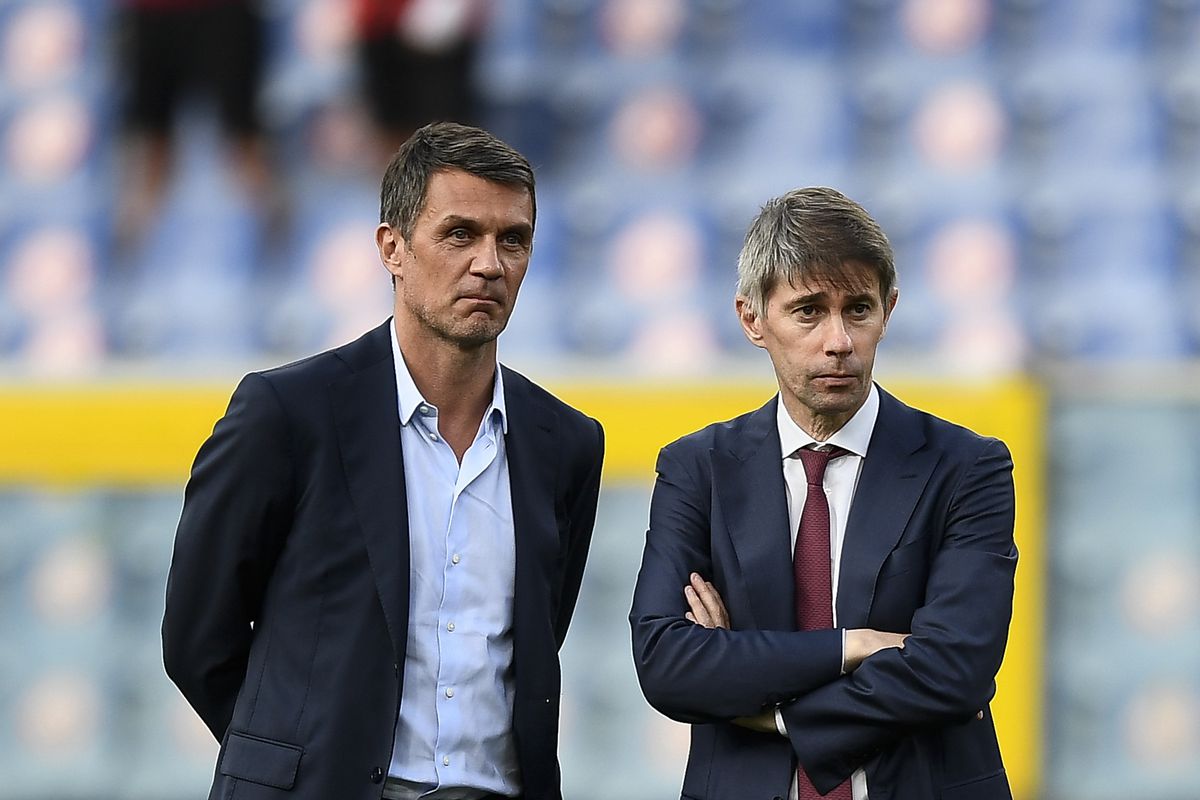 Paolo Maldini (L), technical area director of AC Milan, and...