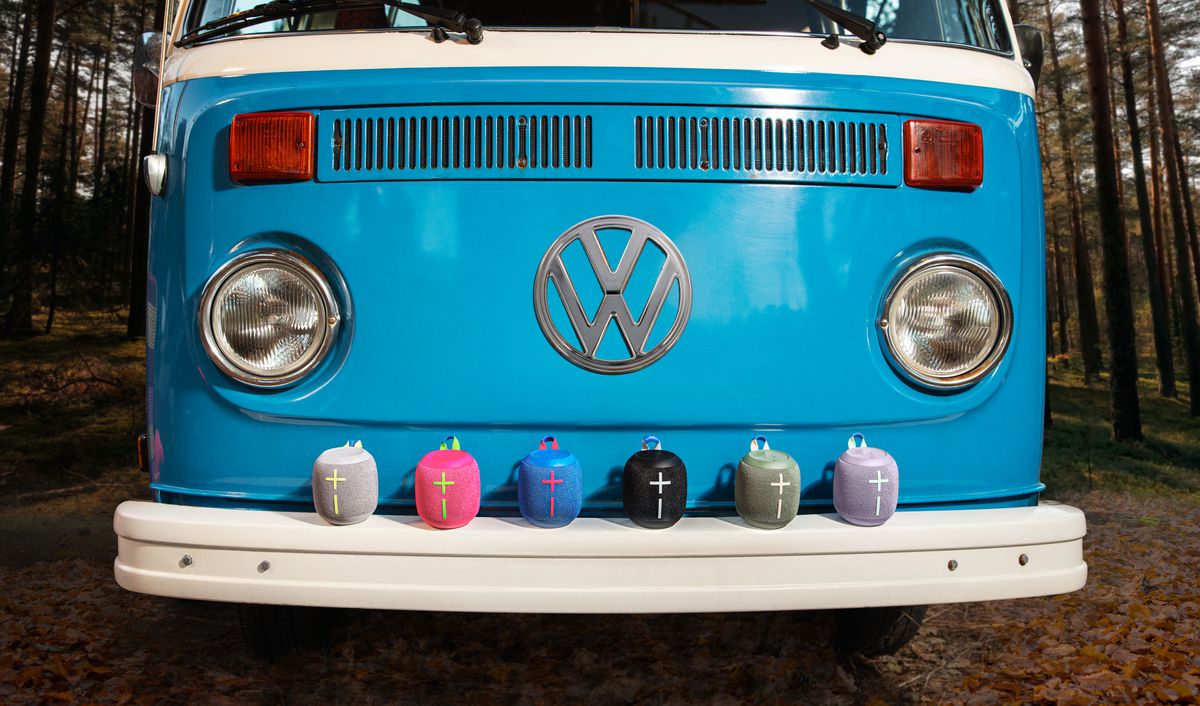 A selection of Wonderboom speakers lined up against a vintage Volkwagon campervan.