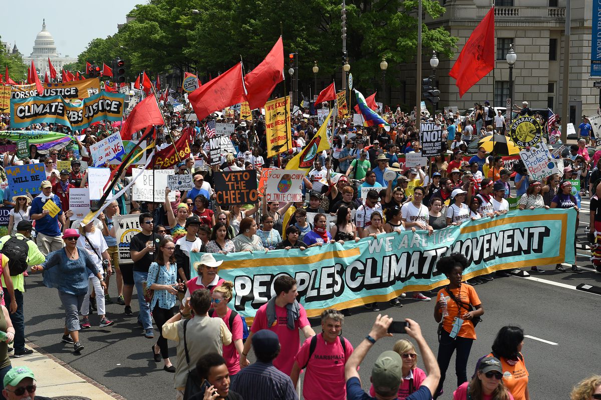 Demonstrators march in Washington, DC in 2017 demanding action on climate change. Polls show that Americans are more worried about climate change.