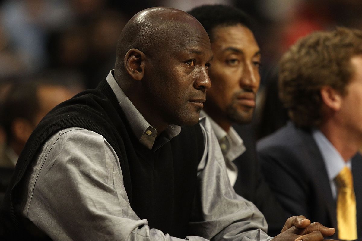 Former players Michael Jordan and Scottie Pippen of the Chicago Bulls watch a game between the Bulls and the Charlotte Bobcats at the United Center on February 15, 2011 in Chicago, Illinois.&nbsp;