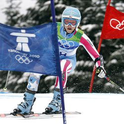Julia Mancuso of the United States speeds down the course during the second run of the Women's giant slalom, at the Vancouver 2010 Olympics in Whistler, British Columbia, Feb. 25, 2010.
