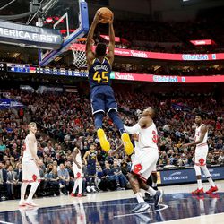Utah Jazz guard Donovan Mitchell (45) goes up for a dunk as the Utah Jazz and the Chicago Bulls play an NBA basketball game at Vivint Arena in Salt Lake City on Wednesday, Nov. 22, 2017.