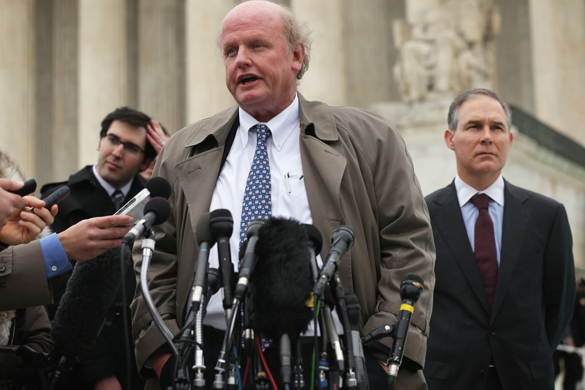 Michael Carvin, lead anti-Obamacare attorney, answers questions outside the Supreme Court after oral arguments.