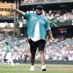 SEATTLE, WASHINGTON - SEPTEMBER 09: Former Seattle Seahawk and Hall of Fame player Walter Jones throws the ceremonial first pitch before the game between the Seattle Mariners and the Atlanta Braves at T-Mobile Park on September 09, 2022 in Seattle, Washington.