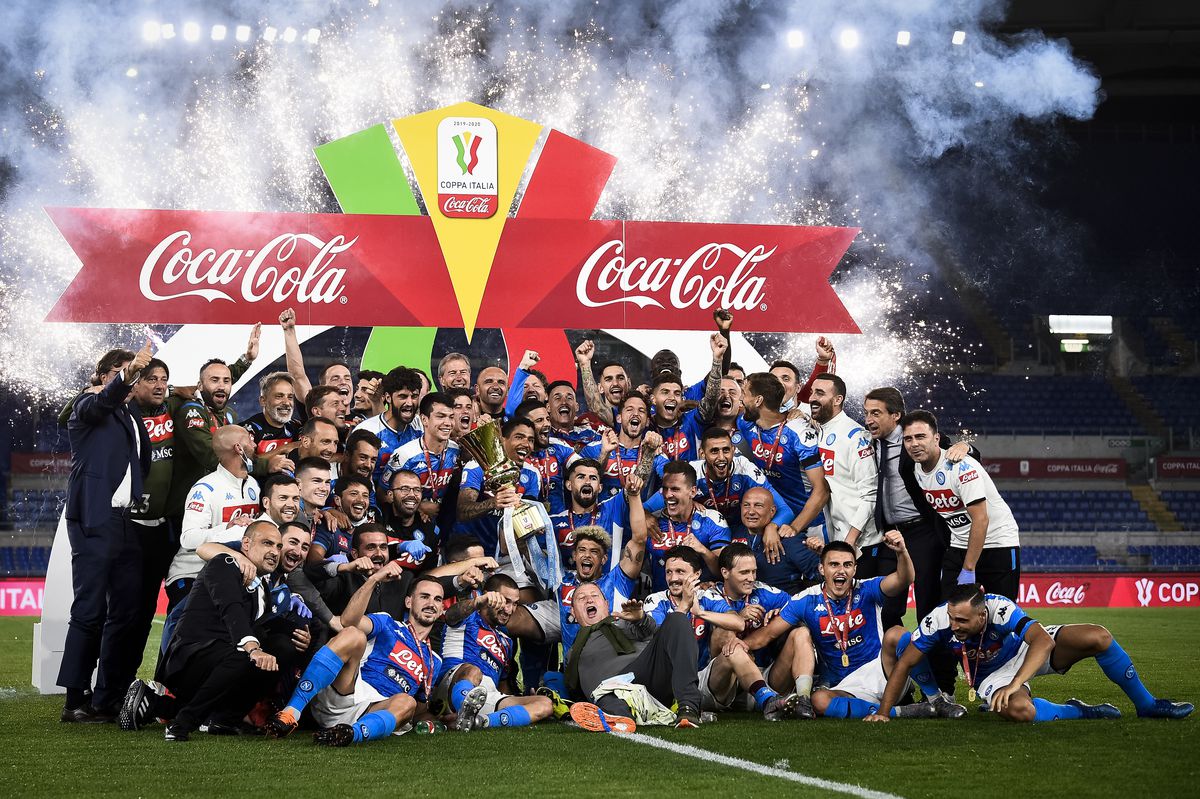 Players of SSC Napoli celebrate with the trophy during the...