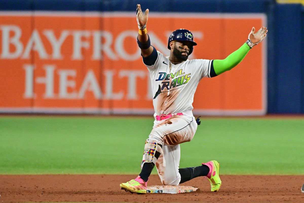 Yandy Diaz of the Tampa Bay Rays reacts after hitting a double in the eighth inning against the Los Angeles Dodgers at Tropicana Field on May 26, 2023 in St Petersburg, Florida.