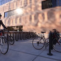 Deseret News reporter Erica Evans finishes her bike commute from South Salt Lake to the Deseret News offices in Salt Lake City on Wednesday, Nov. 7, 2018.