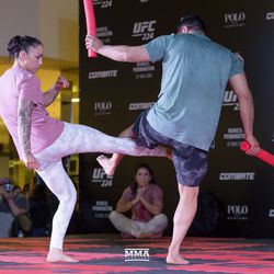 Raquel Pennington throws a low kick at the UFC 224 open workouts Wednesday inside Barra Shopping Mall in Rio de Janeiro, Brazil.