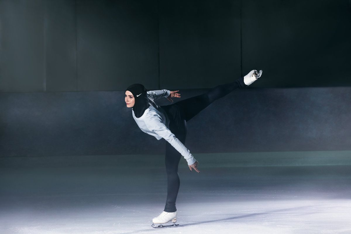 Zahra Lari wears Nike’s black hijab while skating on a rink. 