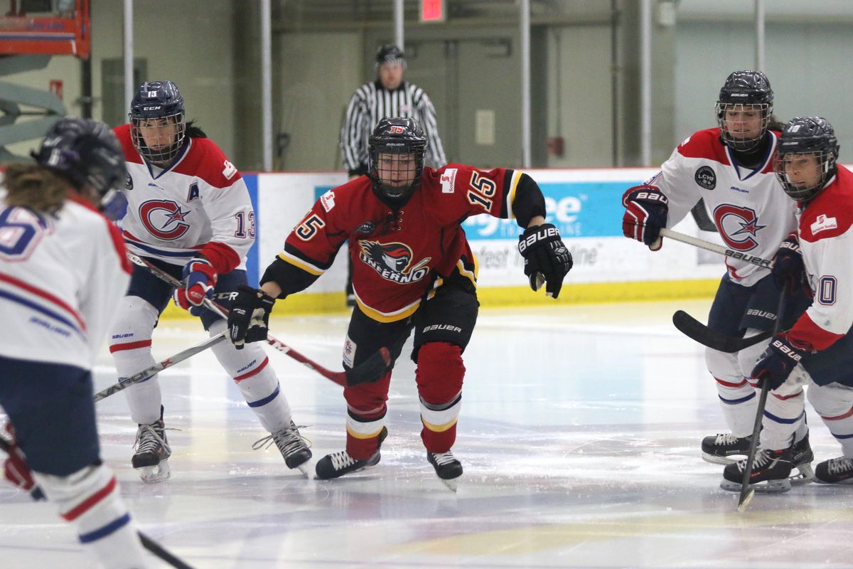 Elana Lovell (center) is up for Rookie of the Year after being a point-per-game player in the regular season for the Inferno. 