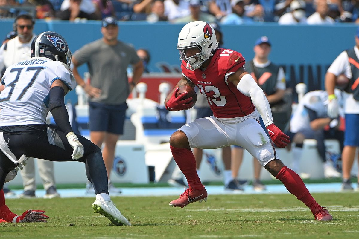 Arizona Cardinals wide receiver Christian Kirk (13) runs the ball after a catch against the Tennessee Titans during the first half at Nissan Stadium.