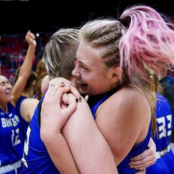 Bingham’s Madison Jones and Jaycee Lichtie celebrate their team’s win over Fremont in the 6A girls basketball championship game at the Huntsman Center in Salt Lake City on Saturday, Feb. 29, 2020.