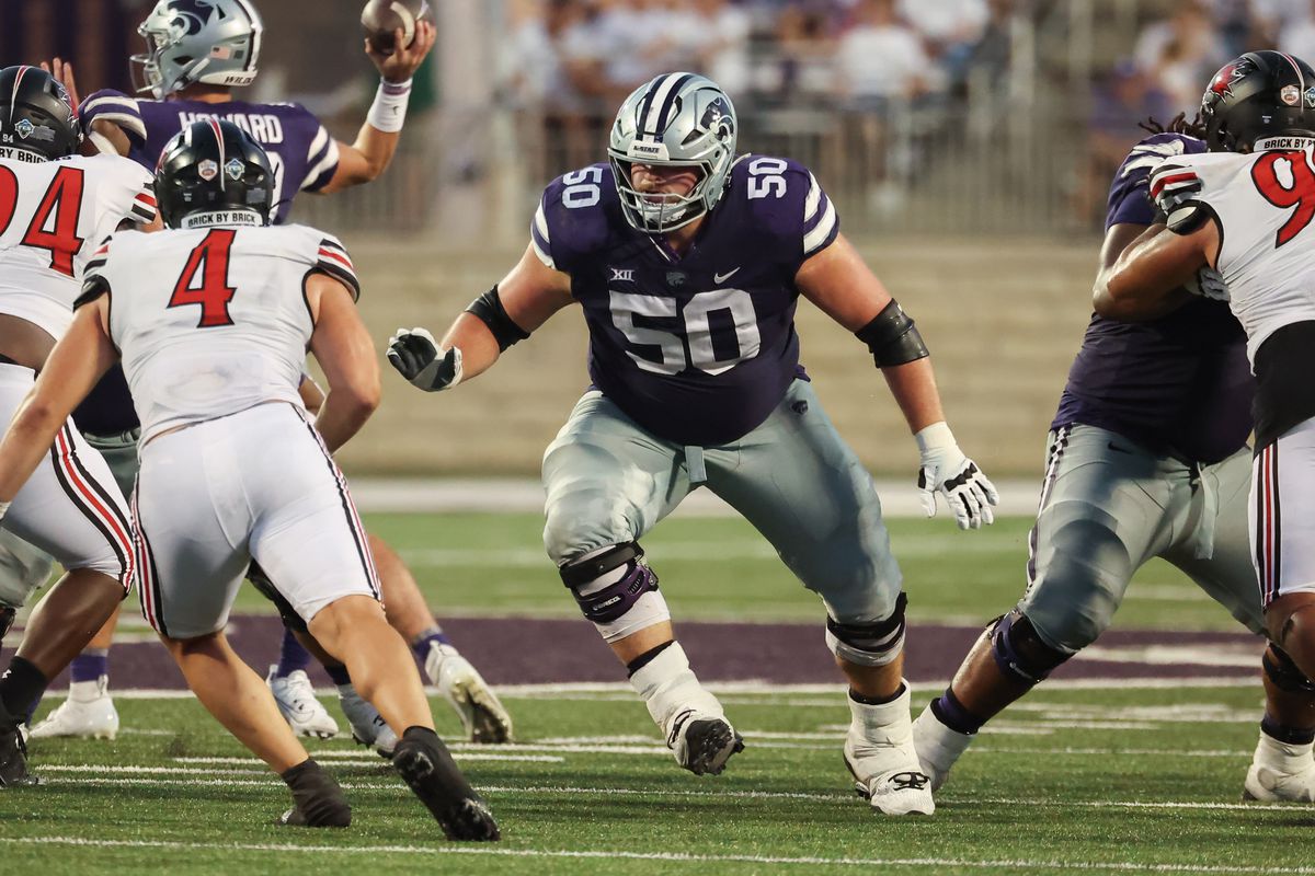 MANHATTAN, KS - SEPTEMBER 02: Kansas State Wildcats offensive lineman Cooper Beebe (50) looks to block in the fourth quarter of a college football game between the Southeast Missouri Redhawks and the Kansas State Wildcats on Sep 2, 2023 at Bill Snyder Family Stadium in Manhattan, KS.