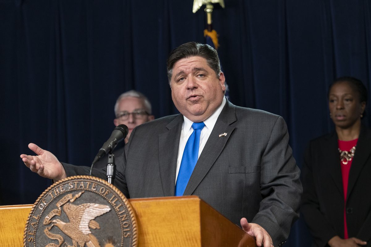 Gov. J.B. Pritzker at a daily briefing in March 2020.