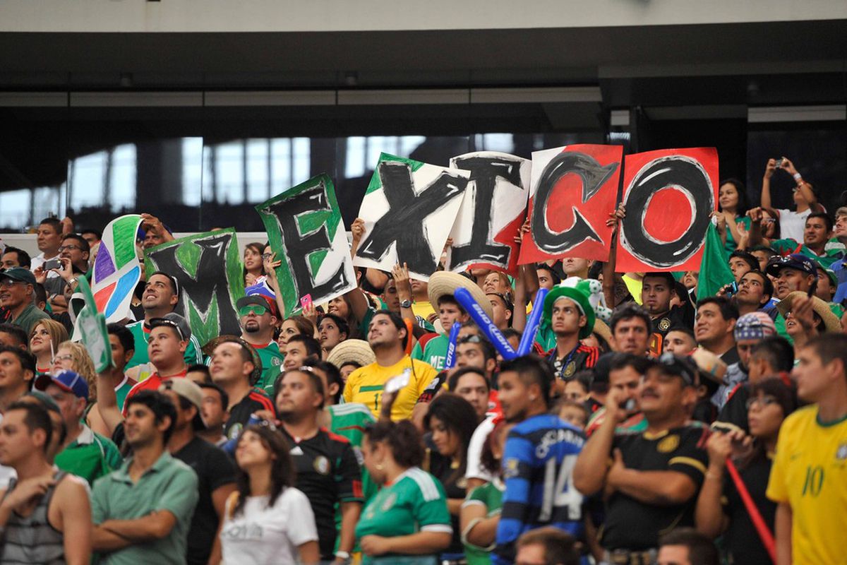 Jun 3, 2012; Arlington, TX, USA; Mexico fans cheer for their team during a friendly match against Brazil at Cowboys Stadium. Mexico shut out Brazil 2-0. Mandatory Credit: Jerome Miron-US PRESSWIRE