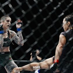 Cat Zingano kicks Megan Anderson at UFC 232.