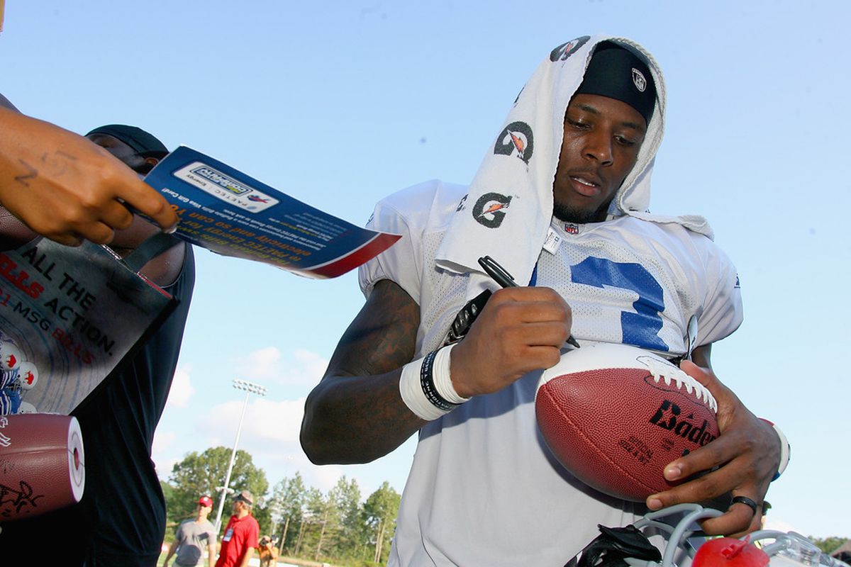 PITTSFORD, NY - AUGUST 08:  Stevie Johnson #13 of the Buffalo Bills signs autographs during the Buffalo Bills Training Camp at St. John Fisher College on August 8, 2011 in Pittsford, New York.  (Photo by Rick Stewart/Getty Images)