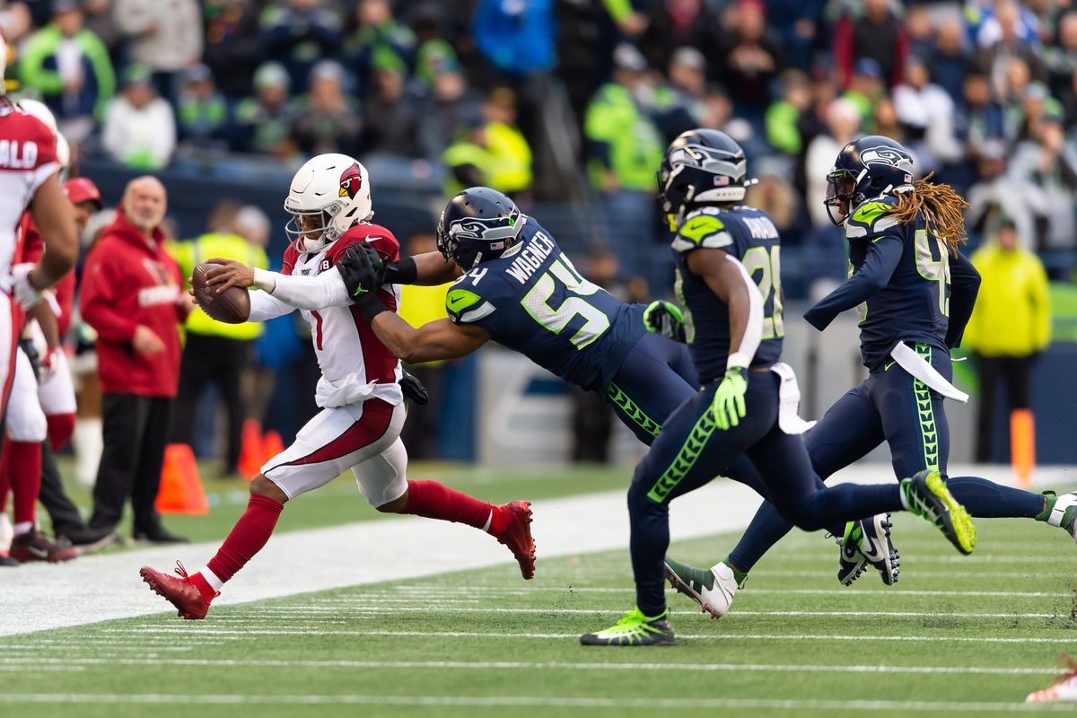 Seattle Seahawks middle linebacker Bobby Wagner forces Arizona Cardinals quarterback Kyler Murray out of bounds just before the first down marker during the first half at CenturyLink Field.
