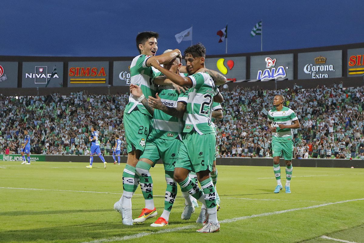 Brian Lozano of Santos celebrates with teammates after scoring the fourth goal of his team at during the 1st round match between Santos Laguna and Monterrey as part of Torneo Apertura 2022 Liga MX Corona Stadium on July 3, 2022 in Torreon, Mexico.