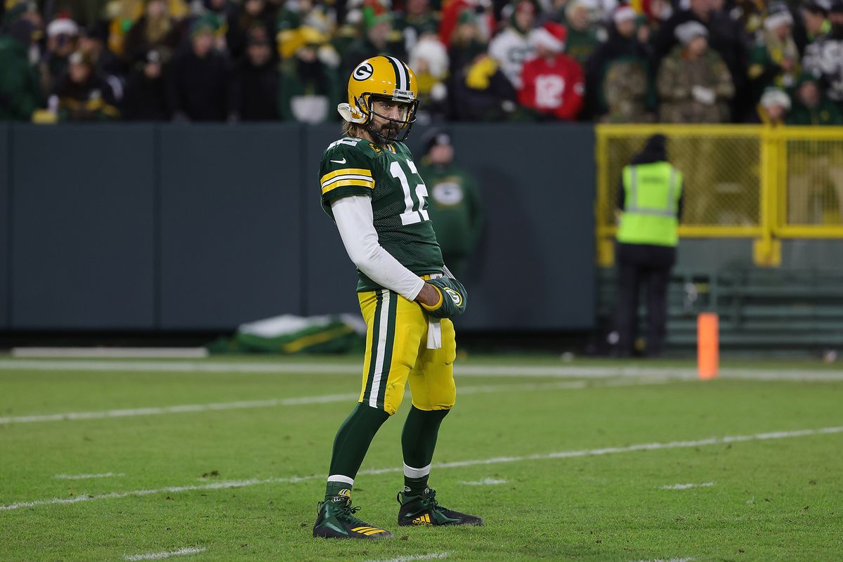 Aaron Rodgers #12 of the Green Bay Packers waits for a timeout during a game against the Cleveland Browns at Lambeau Field on December 25, 2021 in Green Bay, Wisconsin.
