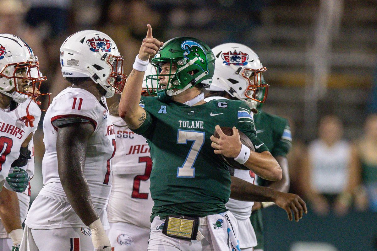Tulane Green Wave quarterback Michael Pratt reacts to making a first down against South Alabama Jaguars defensive lineman Jamie Sheriff during the second half at Yulman Stadium.
