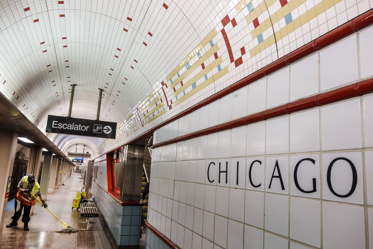 Chicago station escalator sign.