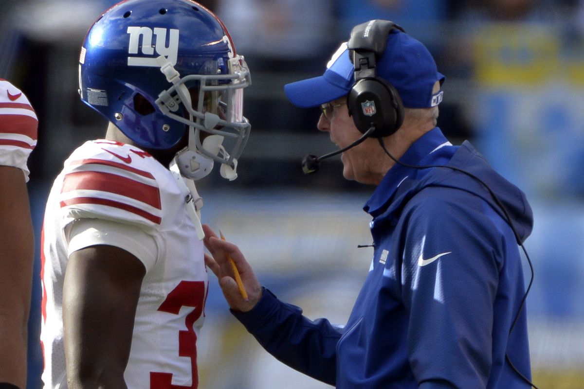 Charles James hears from Tom Coughlin during a game last season