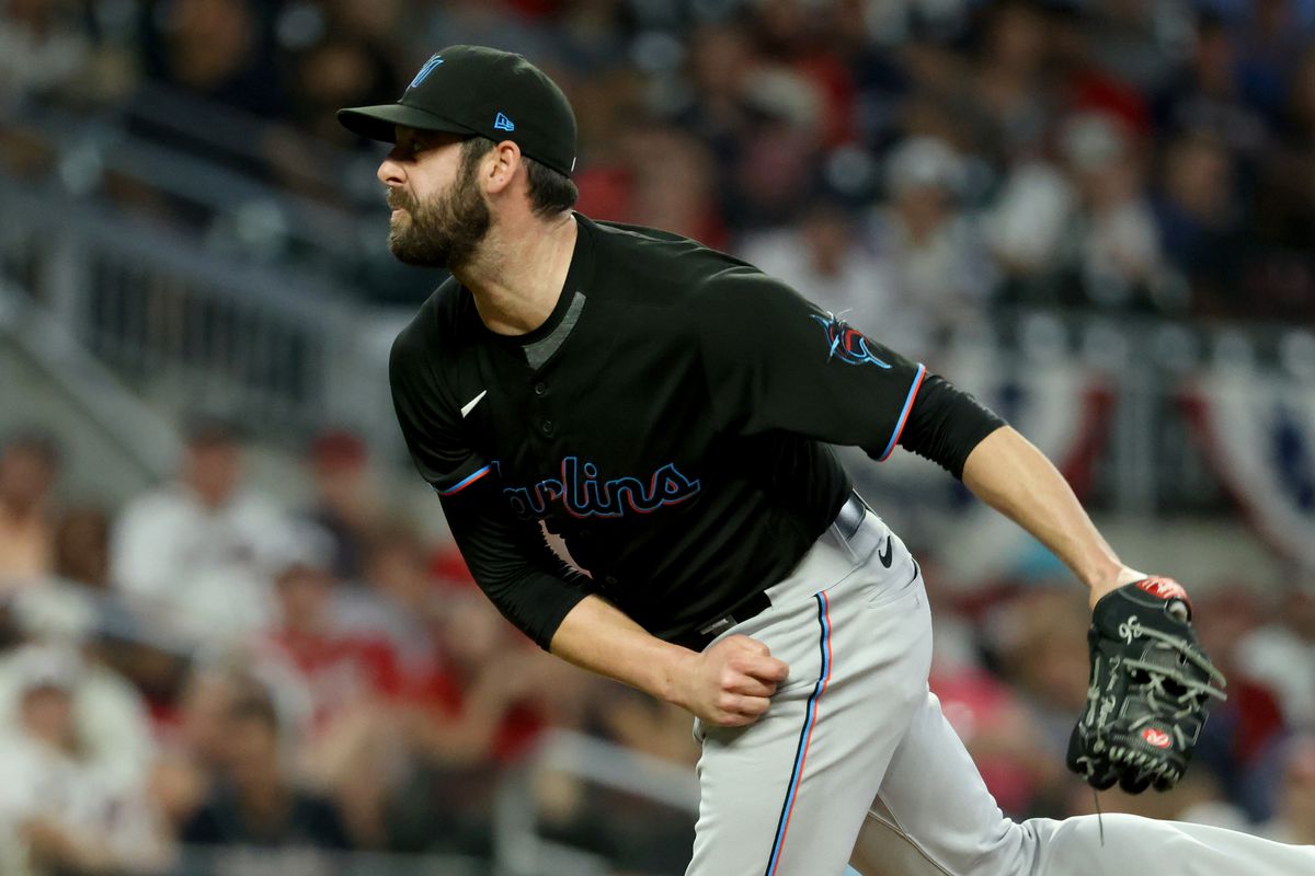 Miami Marlins relief pitcher Dylan Floro (36) delivers against an Atlanta Braves batter during the ninth inning at Truist Park.