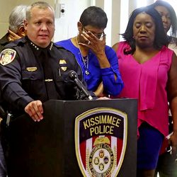 CORRECTS UPDATED INFORMATION OF POLICE OFFICER SHOT - Kissimmee Police Chief Jeff O'Dell, left, holds a news conference Saturday, Aug. 19, 2017 in Kissimmee, Fla. The Kissimmee Police Department says Sgt. Sam Howard died Saturday from his injuries. His colleague, Officer Matthew Baxter, died Friday night after the attack in a neighborhood of Kissimmee, located south of the theme park hub of Orlando.