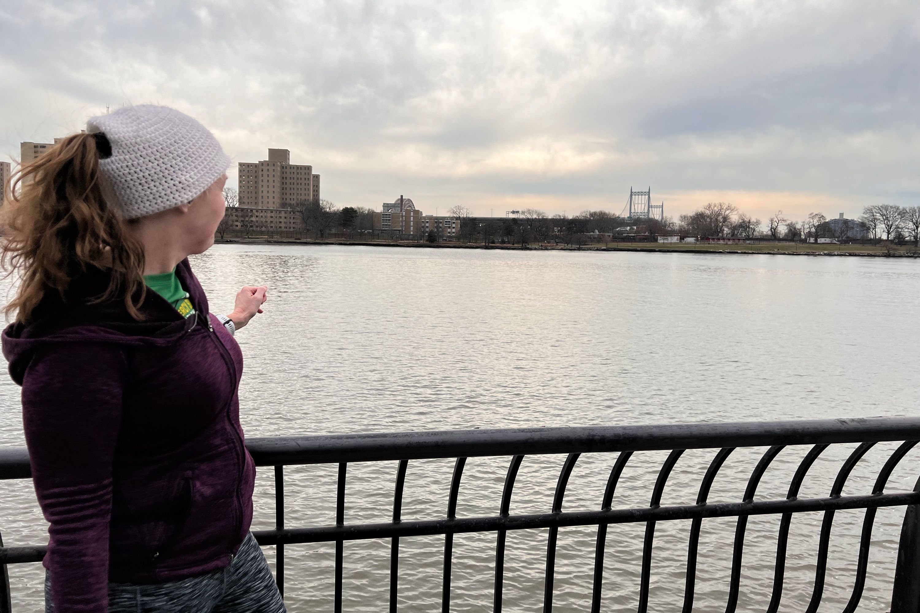 Aimee Parow looks over the Harlem River along the Bobby Wagner Walk.