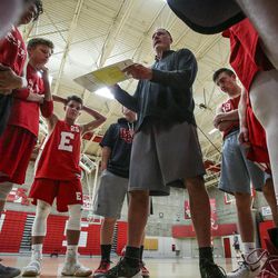 Mitch Smith, coach of the East High School varsity boys basketball team, speaks to his team during the spring league tournament at East High School in Salt Lake City on Thursday, May 18, 2017. East beat Granger 57-56.