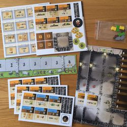 A look at the components that come in the game. The design can accommodate two players or it can be played solo.