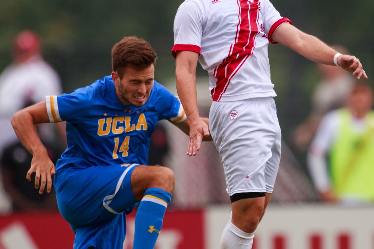 Indiana University soccer player Ian Black (22) and UCLA’s...