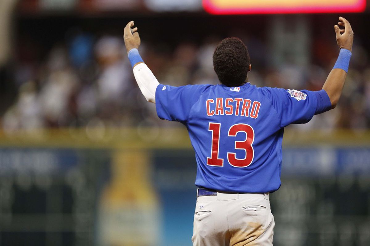 Houston, TX, USA; Chicago Cubs shortstop Starlin Castro reacts to flying out to end the seventh inning against the Houston Astros at Minute Maid Park. Mandatory Credit: Thomas Campbell-US PRESSWIRE