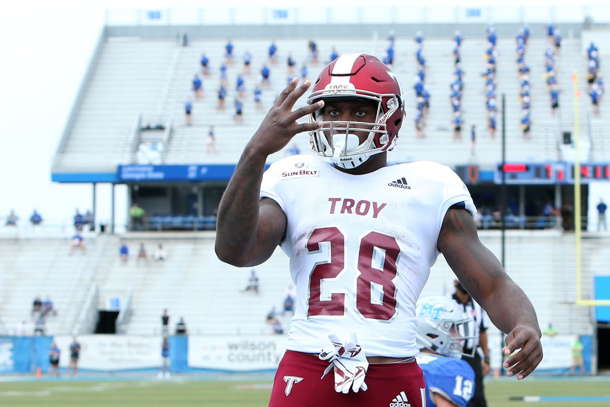 Troy Trojans running back Charles Strong celebrates after scoring a touchdown in a game between the Middle Tennessee Blue Raiders and the Troy Trojans on September 19, 2020, at Floyd Stadium in Murfreesboro, Tennessee.