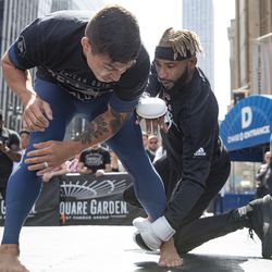 Darrion Caldwell shows off a bit of his wrestling for fans gathered outside of Madison Square Garden