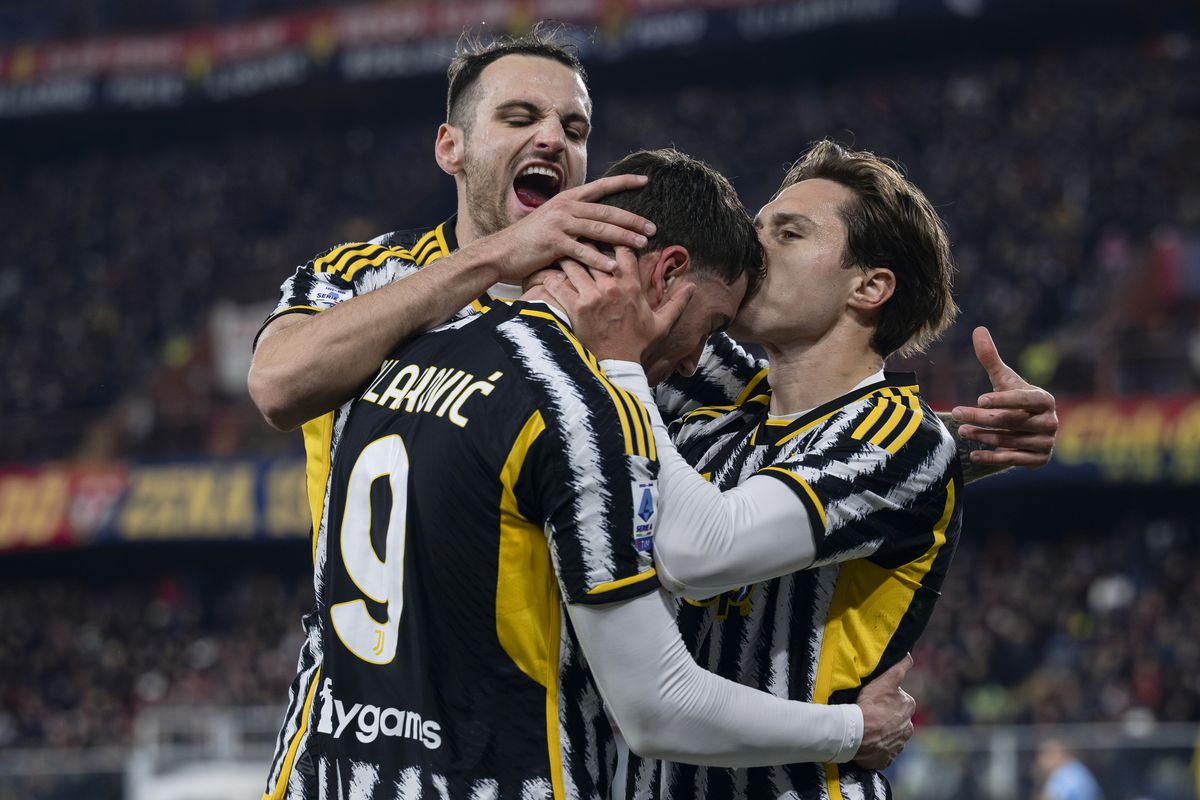 Federico Chiesa (R) of Juventus FC celebrates with Dusan...