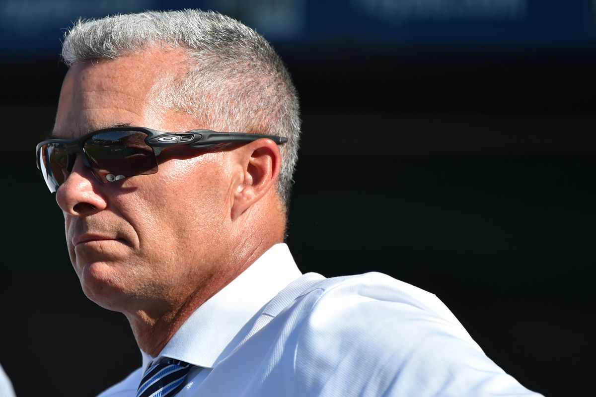 General manager Dayton Moore of the Kansas City Royals watches batting practice prior to a game against the Baltimore Orioles at Kauffman Stadium on August 30, 2019 in Kansas City, Missouri. Owner David Glass has agreed to to sell the team to a group led by Kansas City business man John Sherman for an estimated $1 billion.
